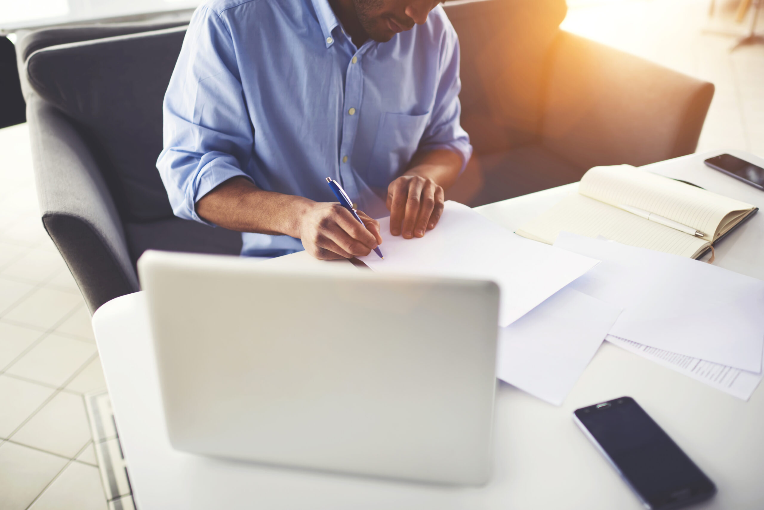 Cropped,Image,Of,Afro,American,Businessman,Doing,Paperwork,Writing,Reports